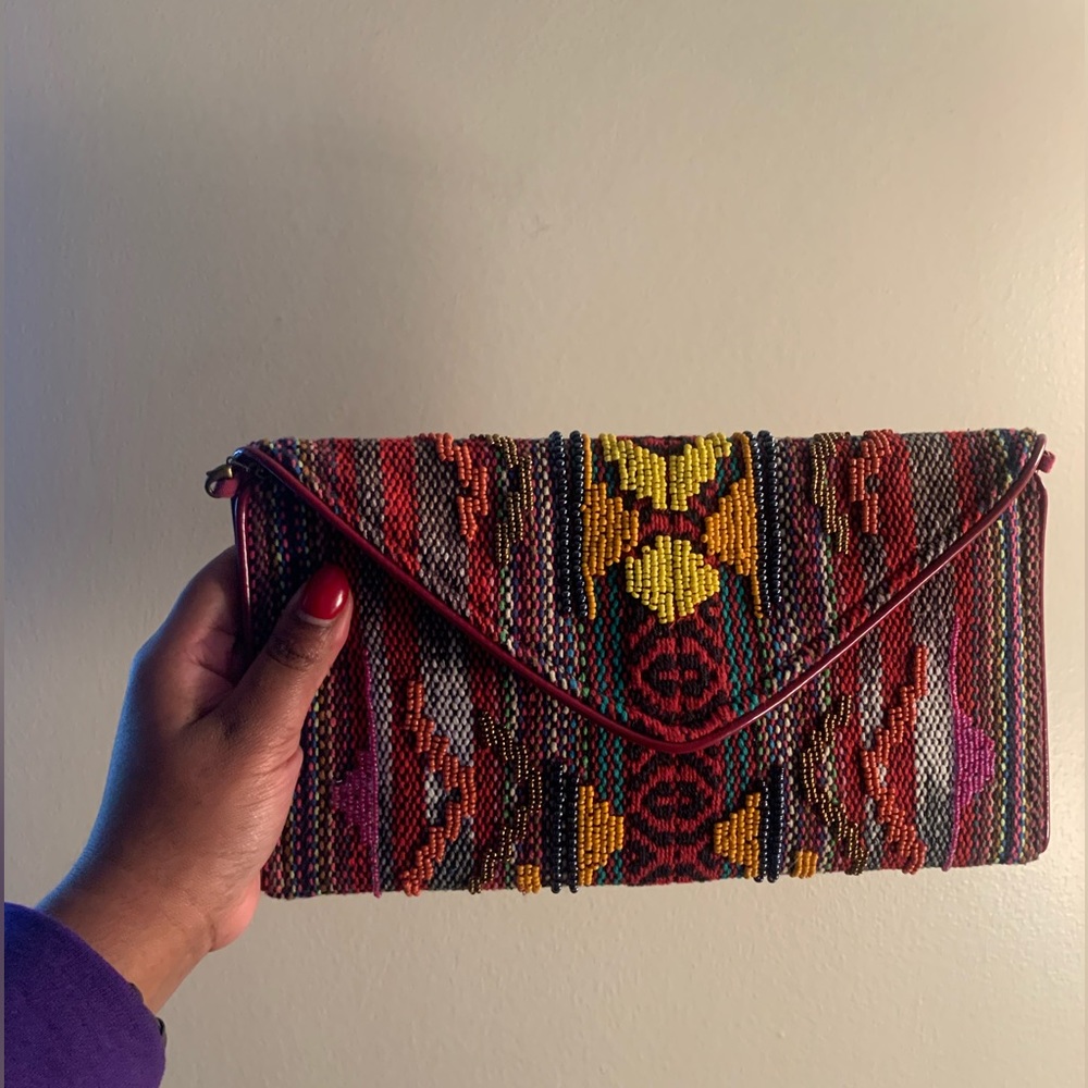 Multi color fabric Steve Madden clutch
